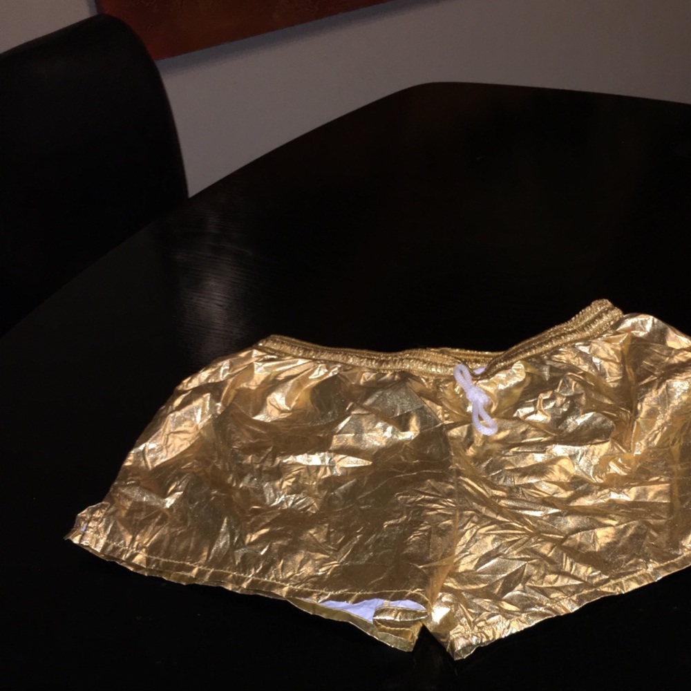 American appears  gold foil shorts
